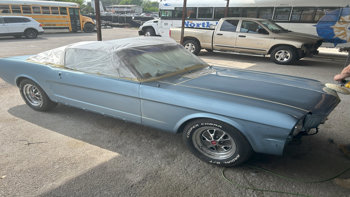 Light blue classic car after an auto body work